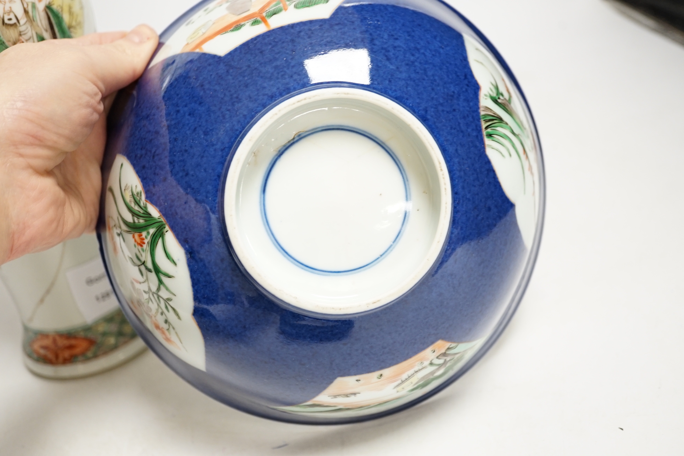 A Chinese famille verte ‘scholars’ vase and a Chinese powder blue bowl, both 19th century, vase, 32cm high